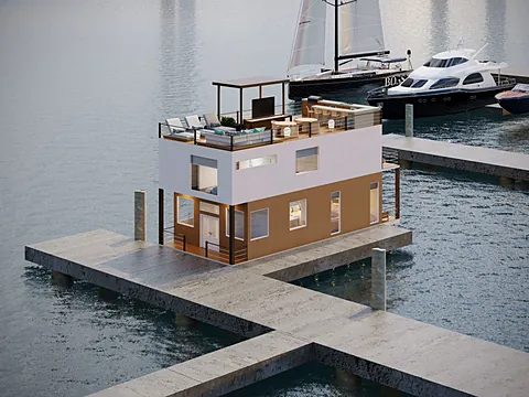 HarborLife houseboat moored at a private dock