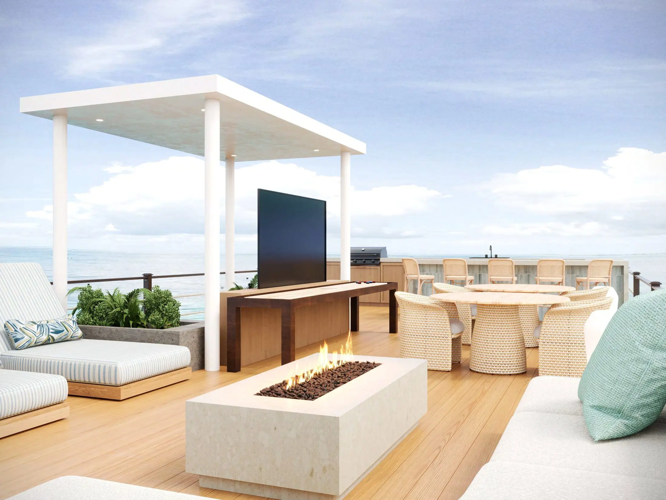 Rooftop lounge with pergola, firepit, and open-water views